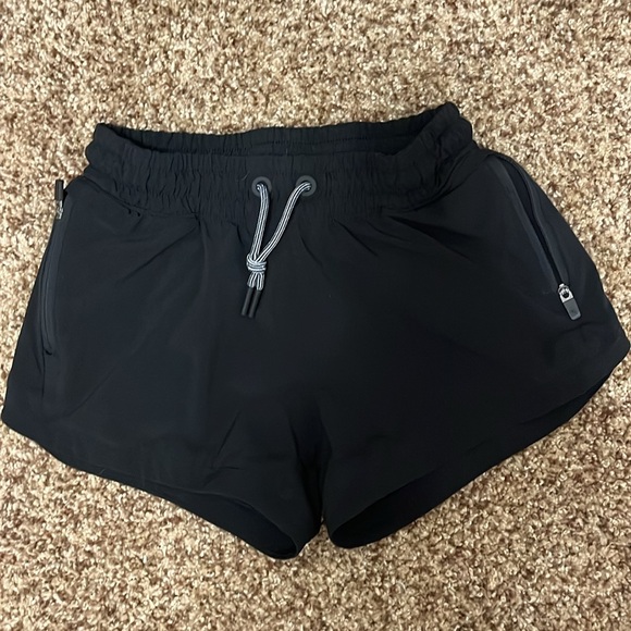 2 pairs (grey and black) size medium (8-10) athleta girl shorts. - Picture 7 of 11